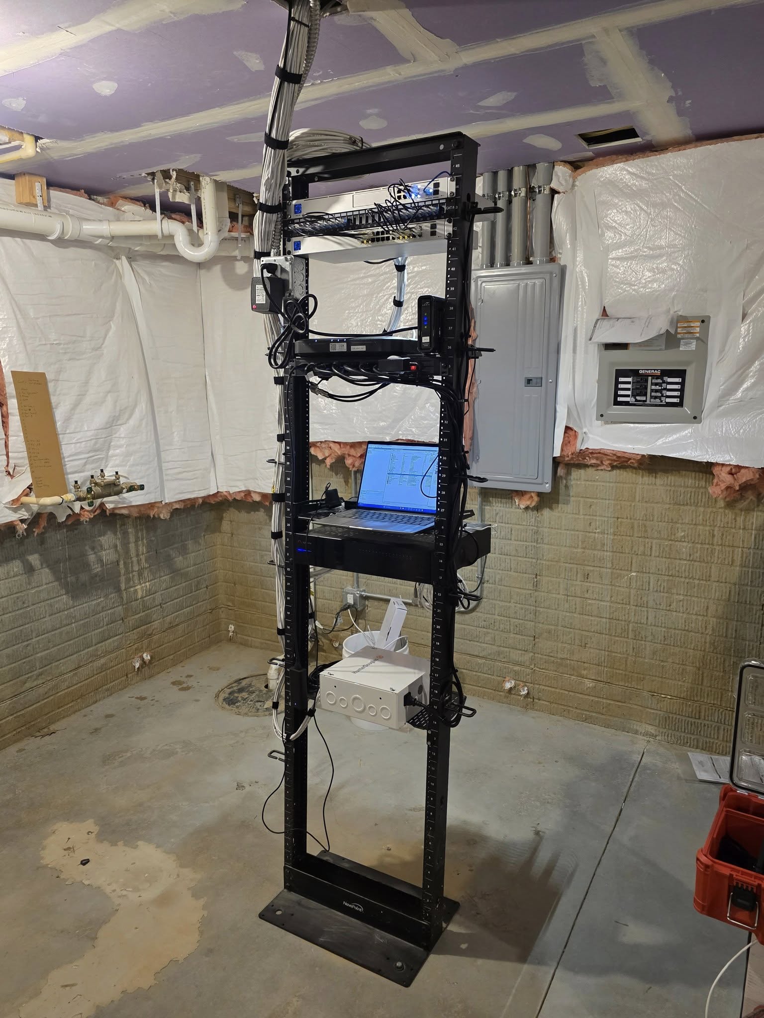 After: clean organized network rack with patch panel and cable management